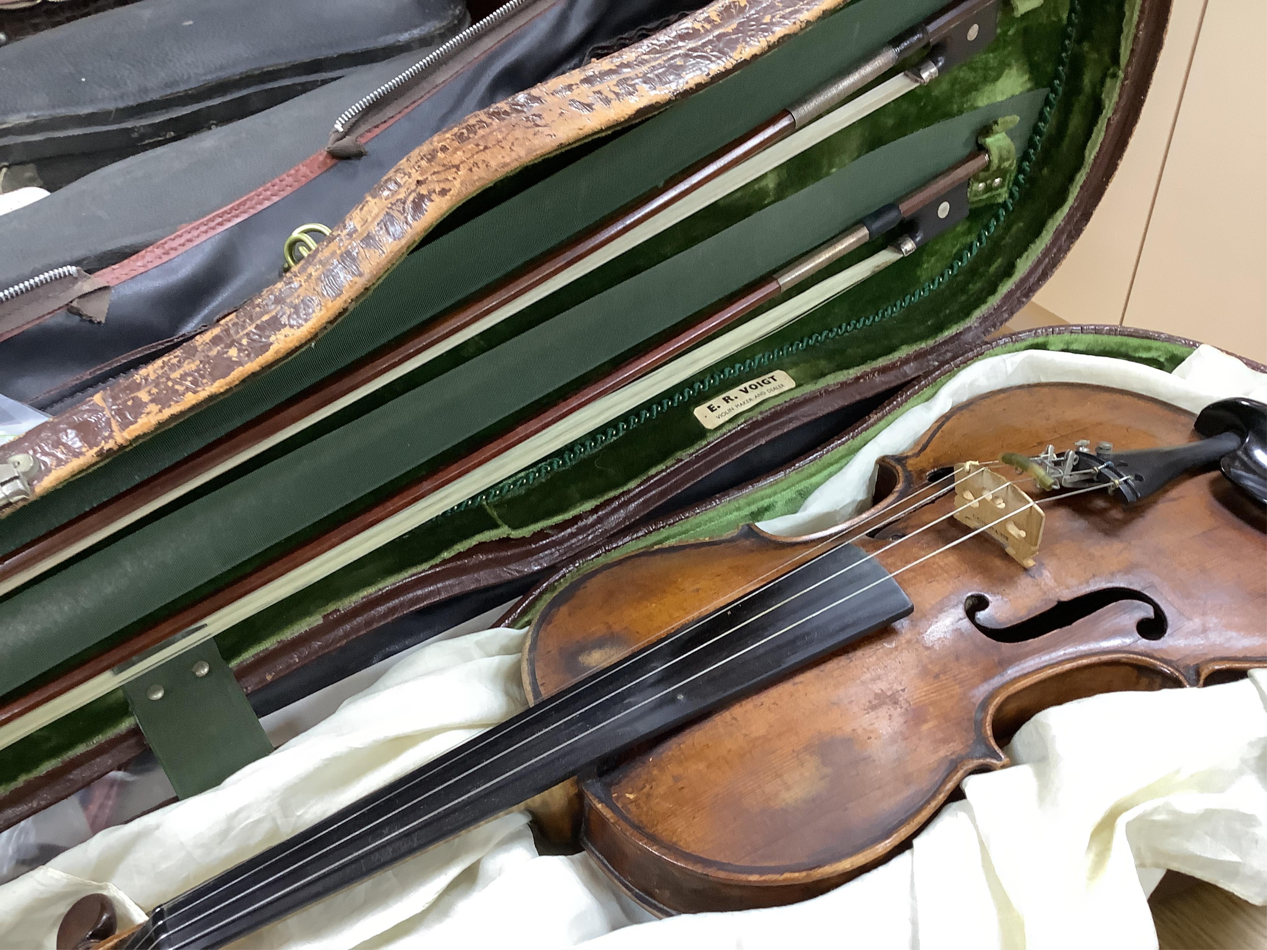 An interesting late 18th century violin, with one piece bird’s eye maple back, unsigned, with two silver fully mounted octagonal bows, one stamped Voight CITES Submission reference, 3XFNUBT7 and Submission reference, RHL
